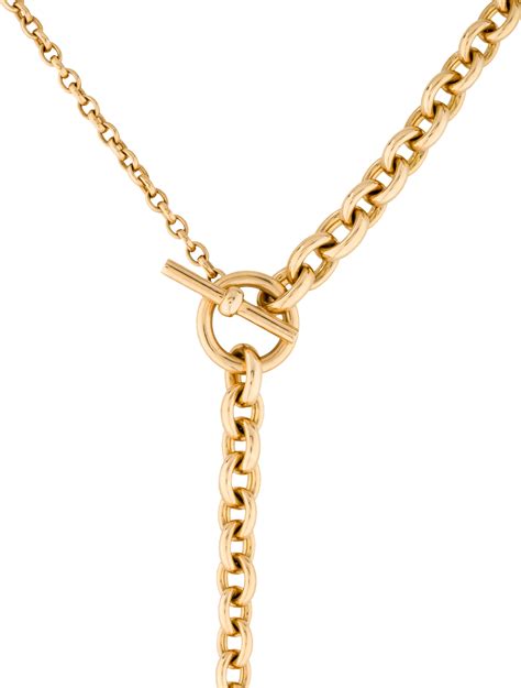 hermes 18k necklace.